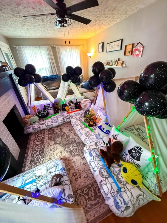 Camp Far, Far Away sleepover setup: Five tents, starry black balloons and the Force strong in this one.