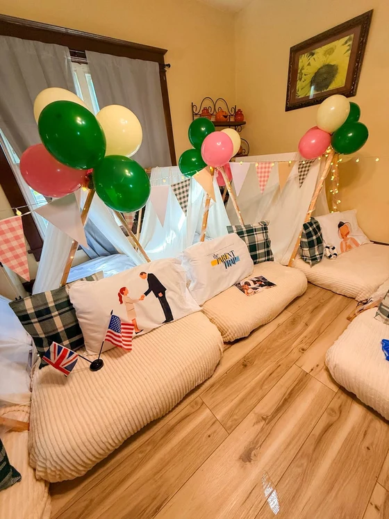 Camp Walden | The Parent Trap sleepover setup: Both flags, and the ripped wedding photo.