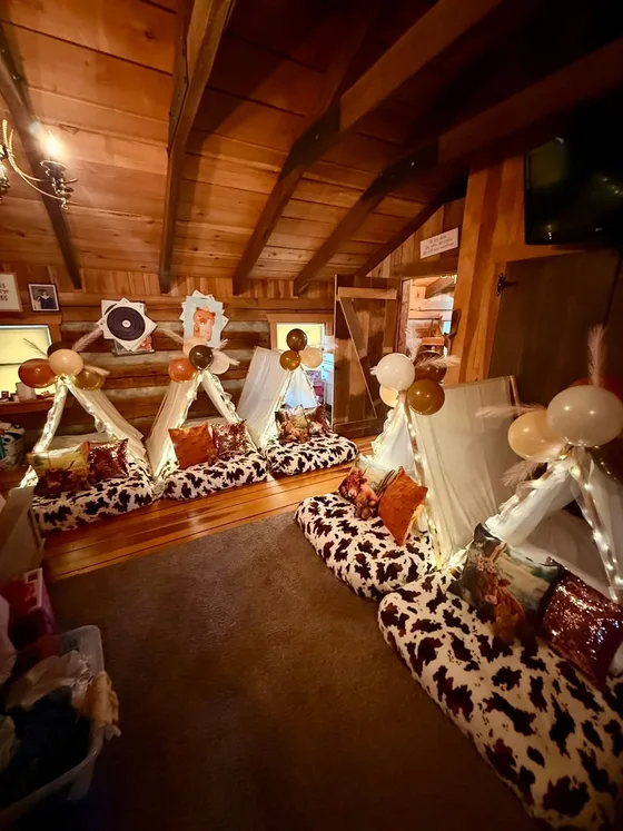 Highland Cow sleepover setup: A full campsite in the loft.