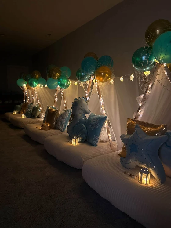 Seaside Dreams sleepover setup: Teal, gold and seashells, brought to life from a client's inspo pics.