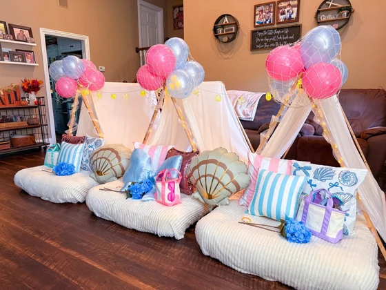 The Summer I Turned Pretty sleepover setup: Coastal stripes, shells and hydrangeas for a beachy east coast summer.