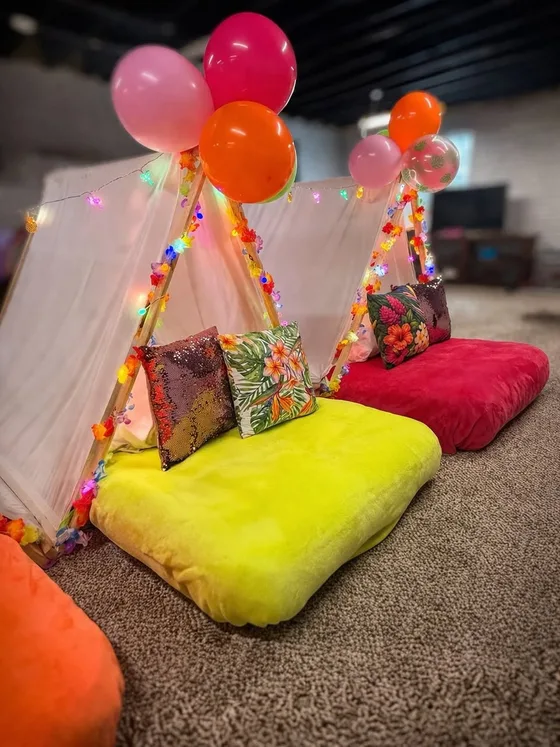 Tropical Bright sleepover setup: Bright colors and tropical florals.