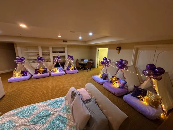 Violet Skies sleepover setup: A full campsite for a 14th birthday.