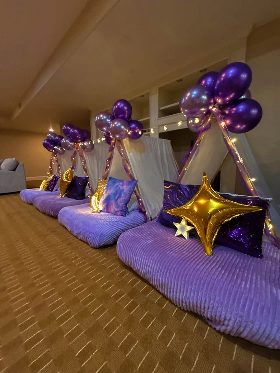Violet Skies sleepover setup: Deep purples, lavender and a room that feels like a night sky.